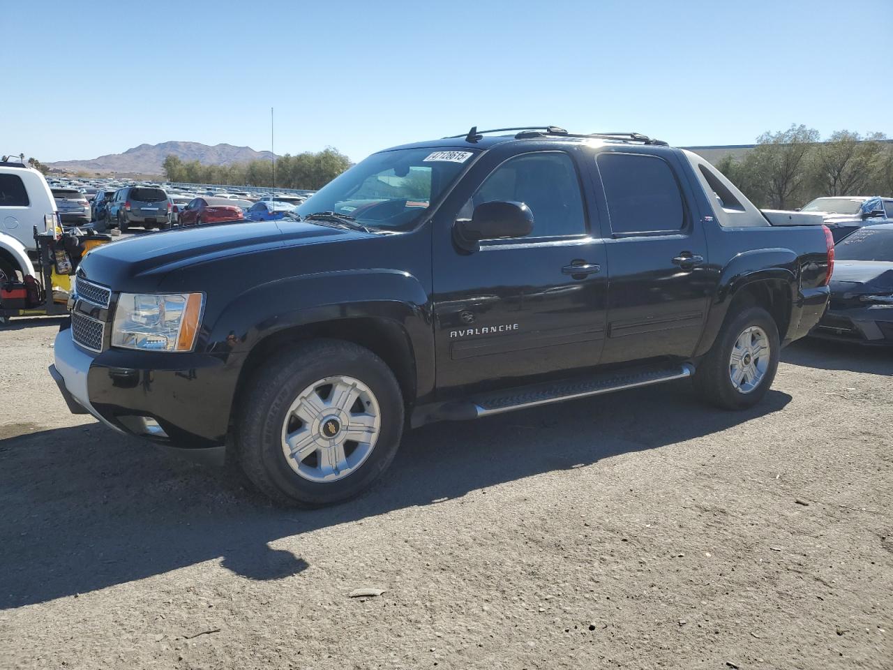 2011 Chevrolet Avalanche - Image 1