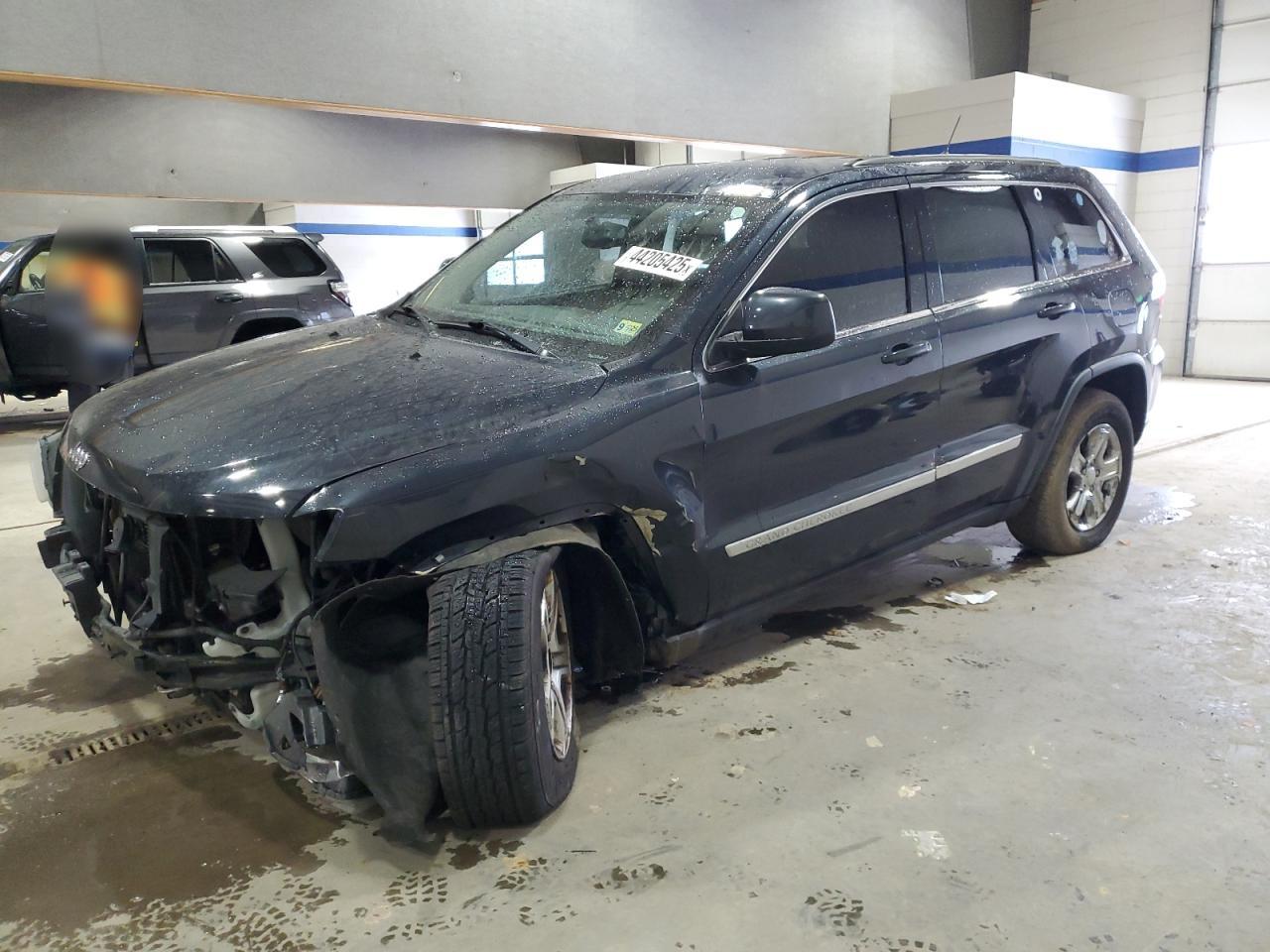 2012 Jeep Grand Cherokee - Image 1