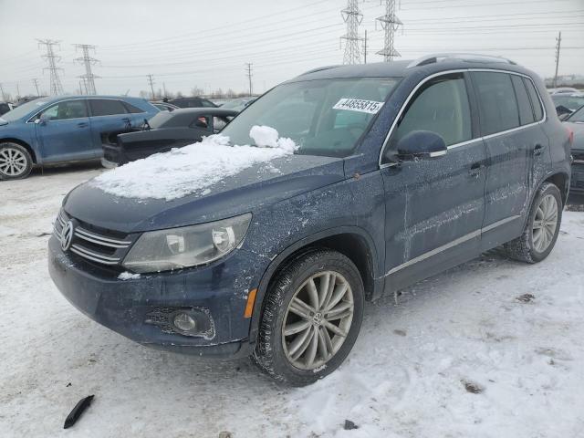  VOLKSWAGEN TIGUAN 2012 Синій