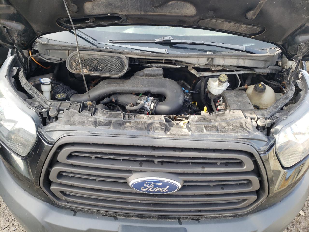 2015 Ford Transit T-150 VIN: 1FTYE1YM8FKB06145 Lot: 65297805