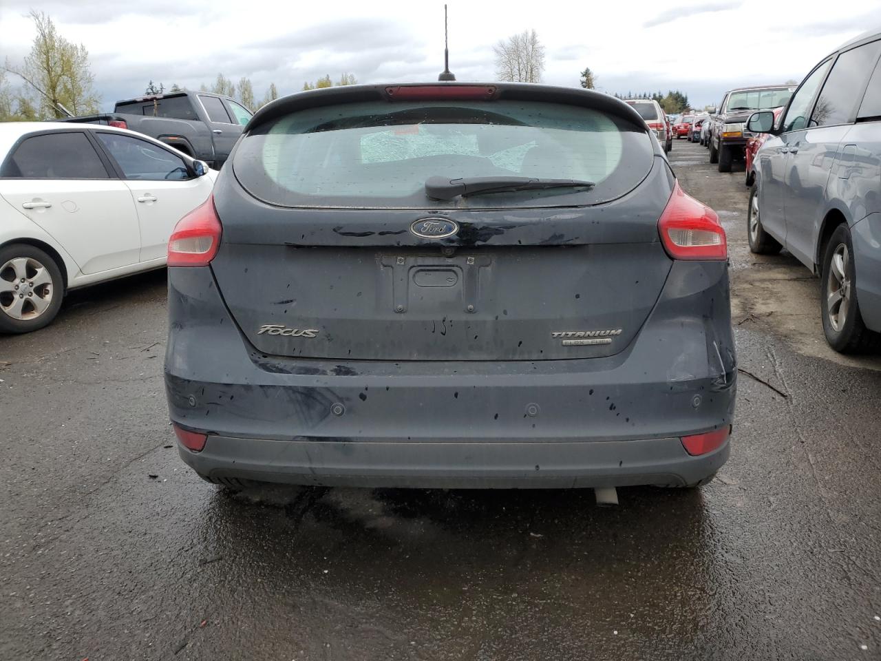 2016 Ford Focus Titanium VIN: 1FADP3N27GL326014 Lot: 48719564