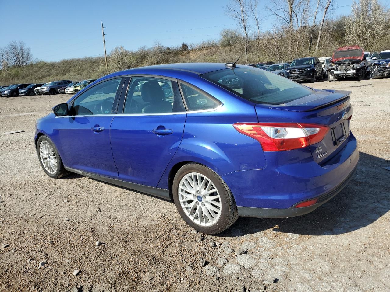 2014 Ford Focus Titanium VIN: 1FADP3J23EL130848 Lot: 46513194