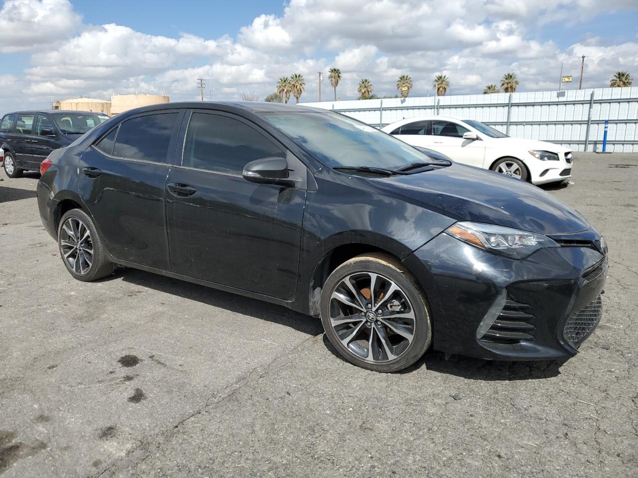 2018 Toyota Corolla L VIN: 5YFBURHE4JP774759 Lot: 49021054