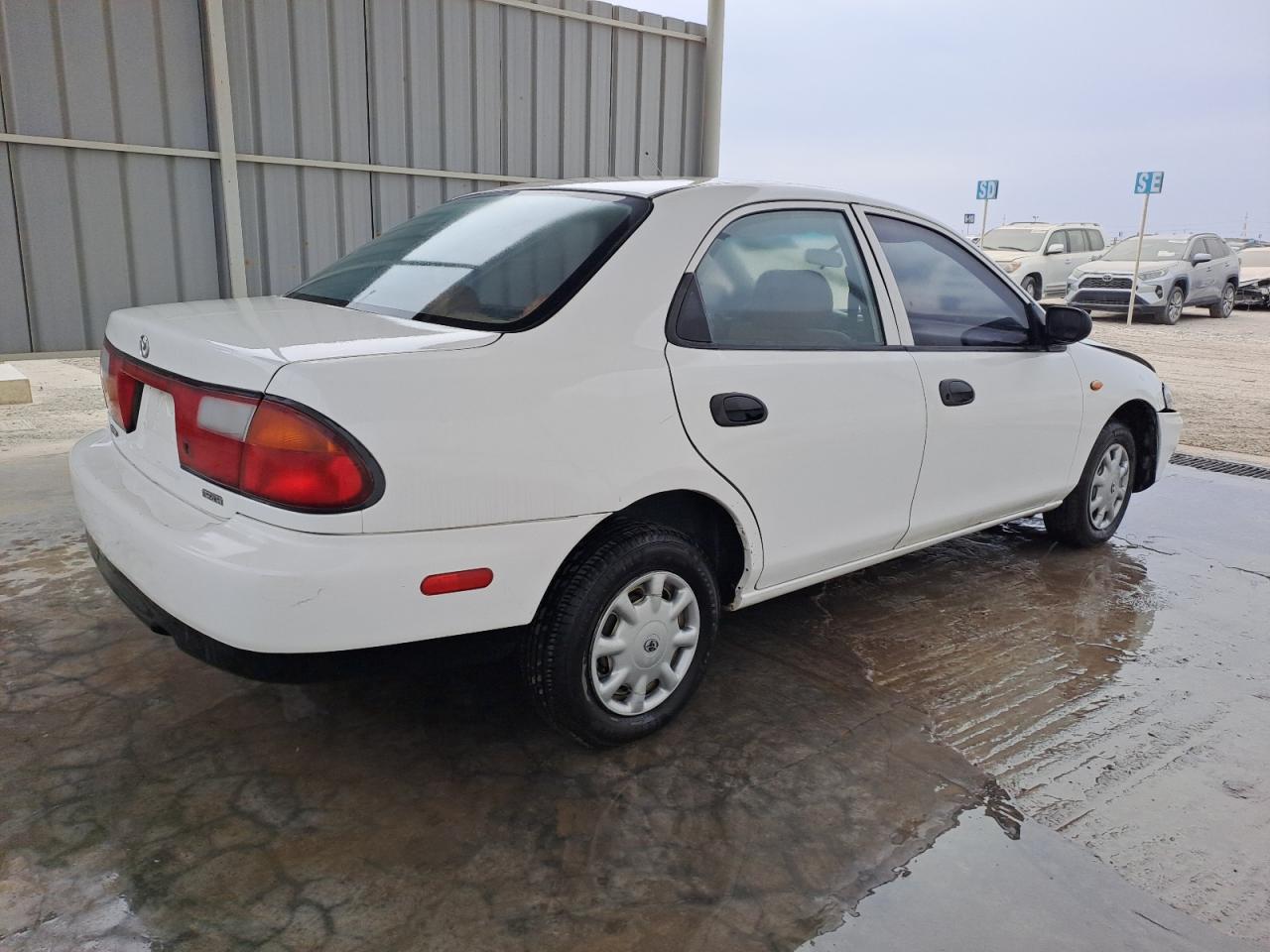 JM7BA1234W0222350 - 2000 Mazda 323 - #49557435