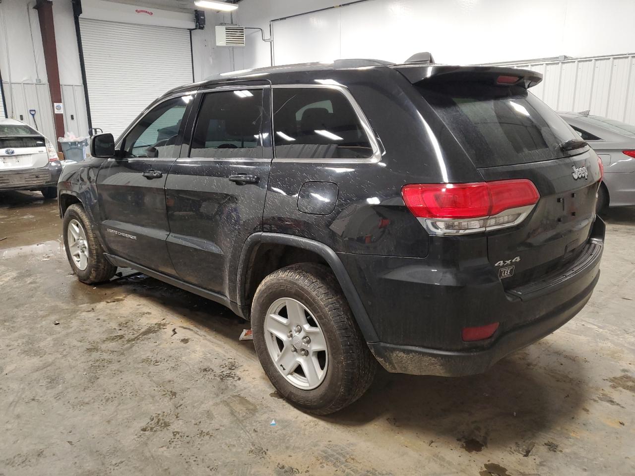 2014 Jeep Grand Cherokee - Image 2