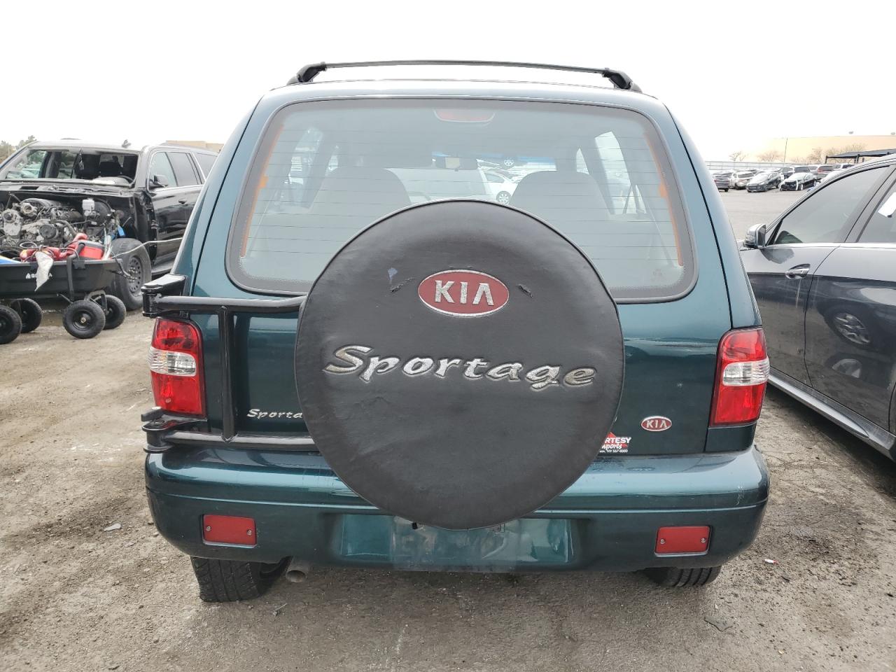 1999 Kia Sportage VIN: KNDJB7232X5612065 Lot: 47575445