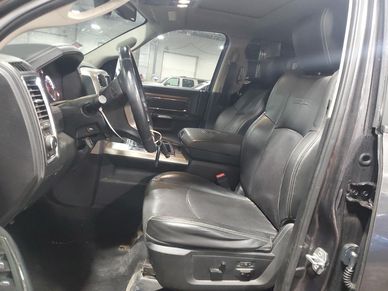 2014 Ram 1500 Laramie VIN: 1C6RR7NT4ES473329 Lot: 49459395