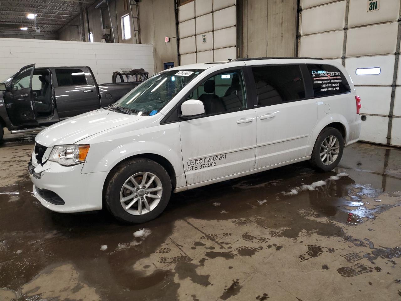 2014 Dodge Caravan - Image 1