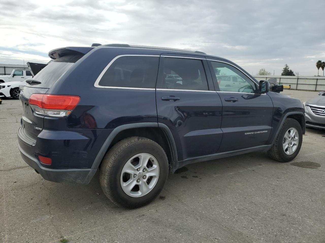 2014 Jeep Grand Cherokee - Image 3