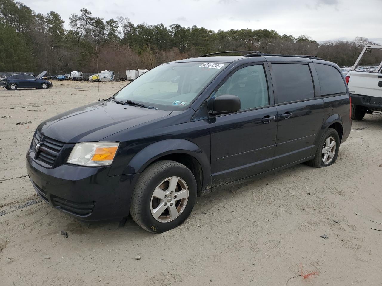 2010 Dodge Caravan - Image 1