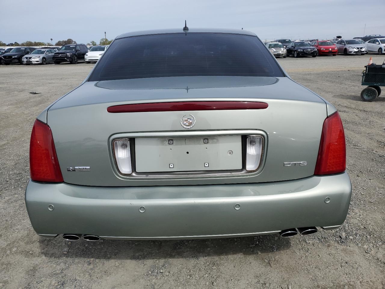 2005 Cadillac Deville Dts VIN: 1G6KF57935U176942 Lot: 49890315