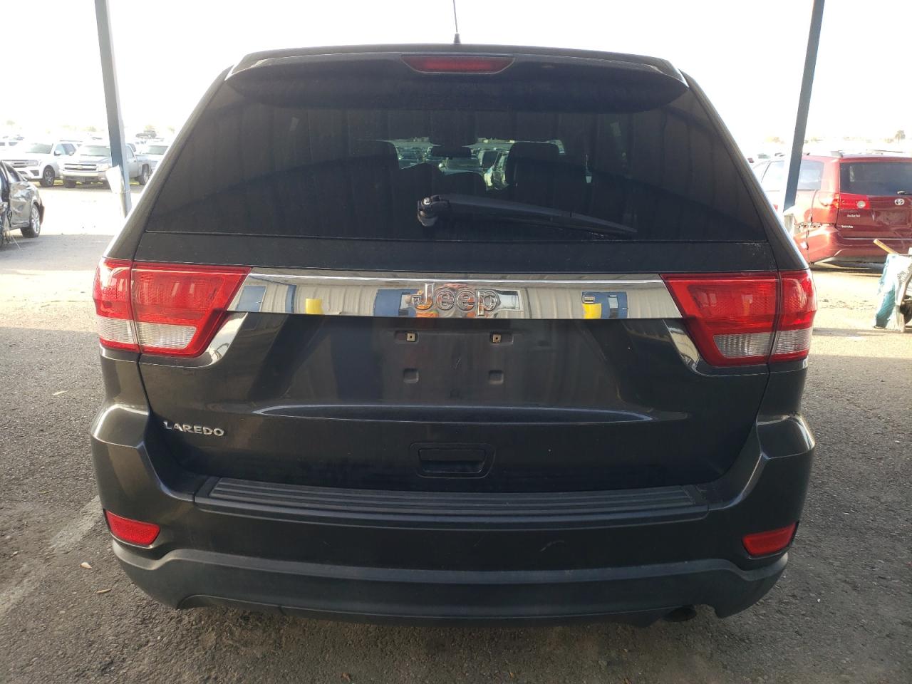 2011 Jeep Grand Cherokee Laredo VIN: 1J4RS4GG1BC585095 Lot: 49999105