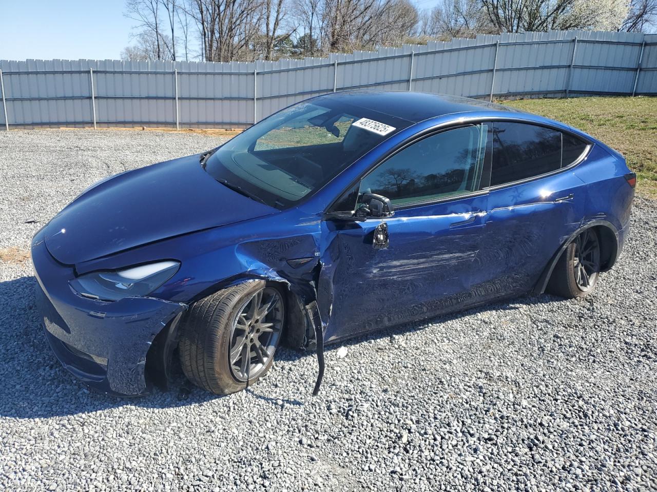 2024 TESLA MODEL Y BLUE VIN: 7SAYGDEE2RA295983