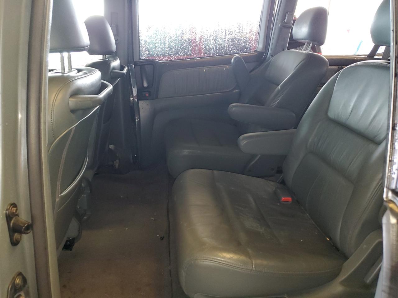 2002 Honda Odyssey Exl VIN: 2HKRL18952H563137 Lot: 49272985