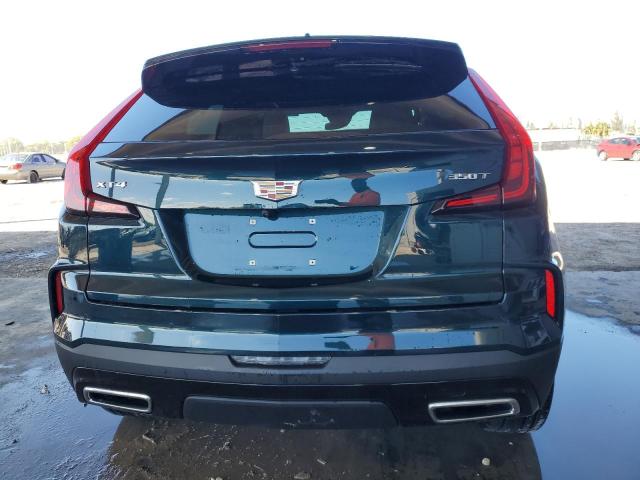  CADILLAC XT4 2024 Зеленый
