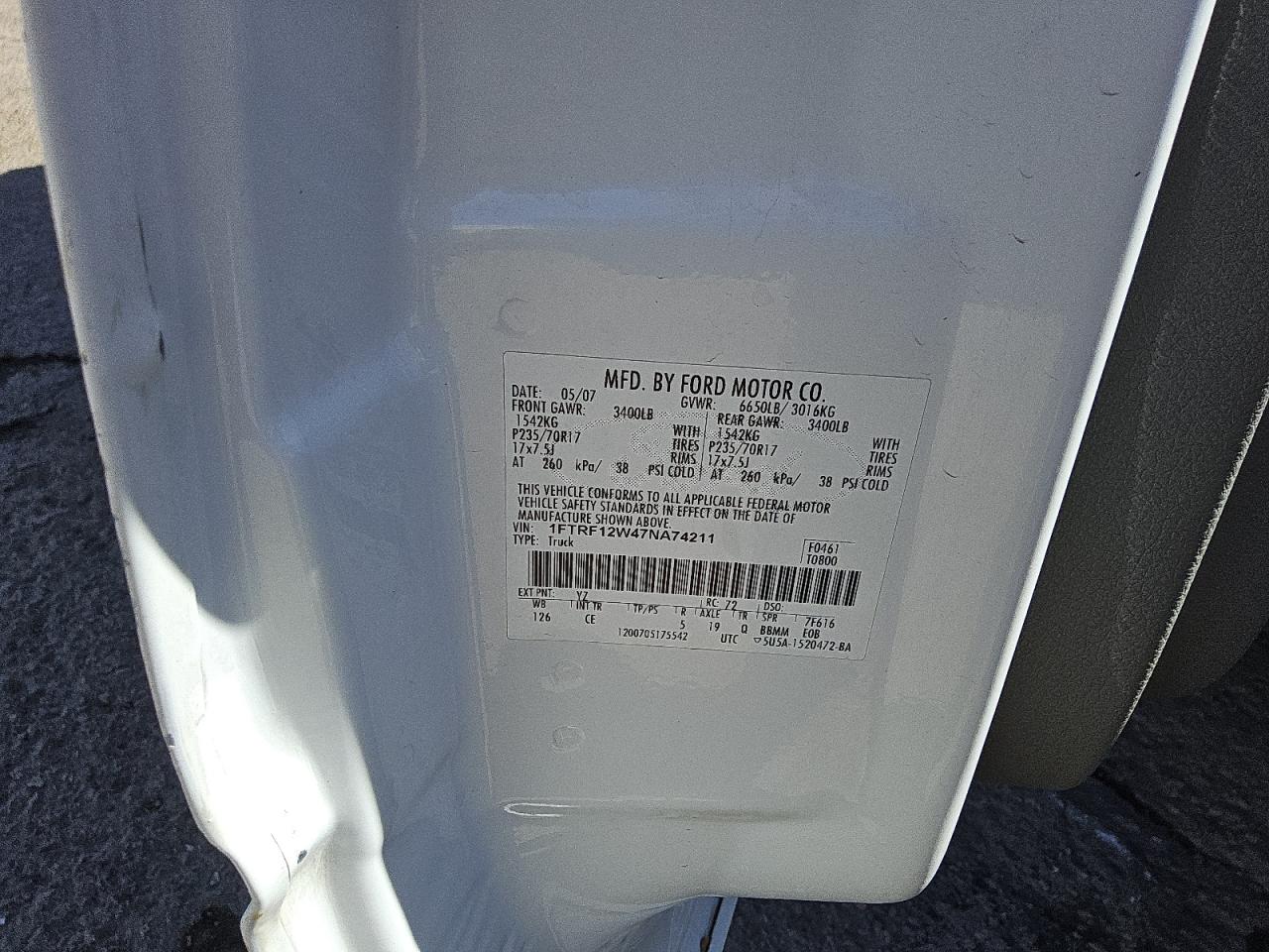 2007 Ford F150 VIN: 1FTRF12W47NA74211 Lot: 47874075
