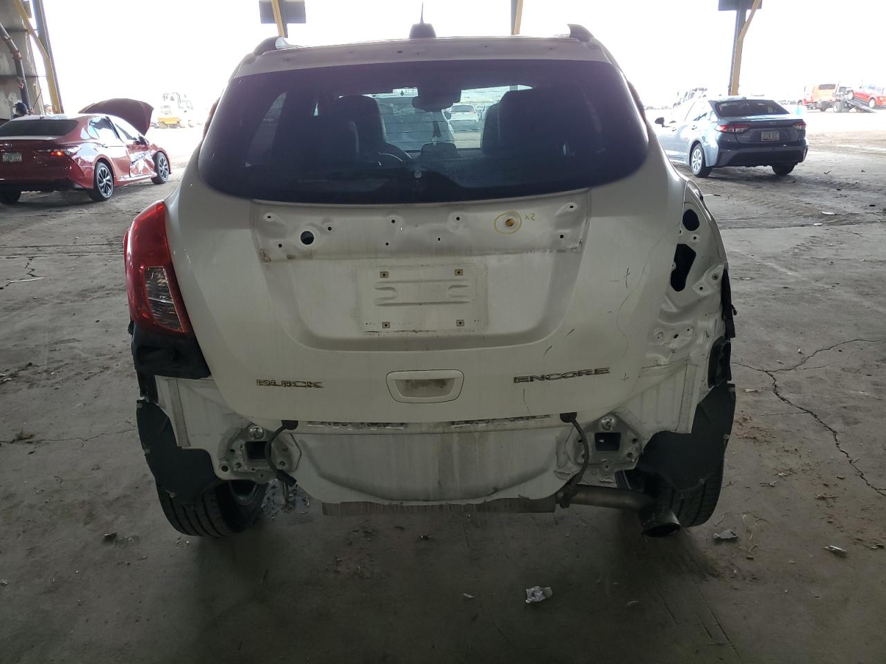 2015 BUICK ENCORE with REAR END damage, VIN KL4CJDSB6FB259549
