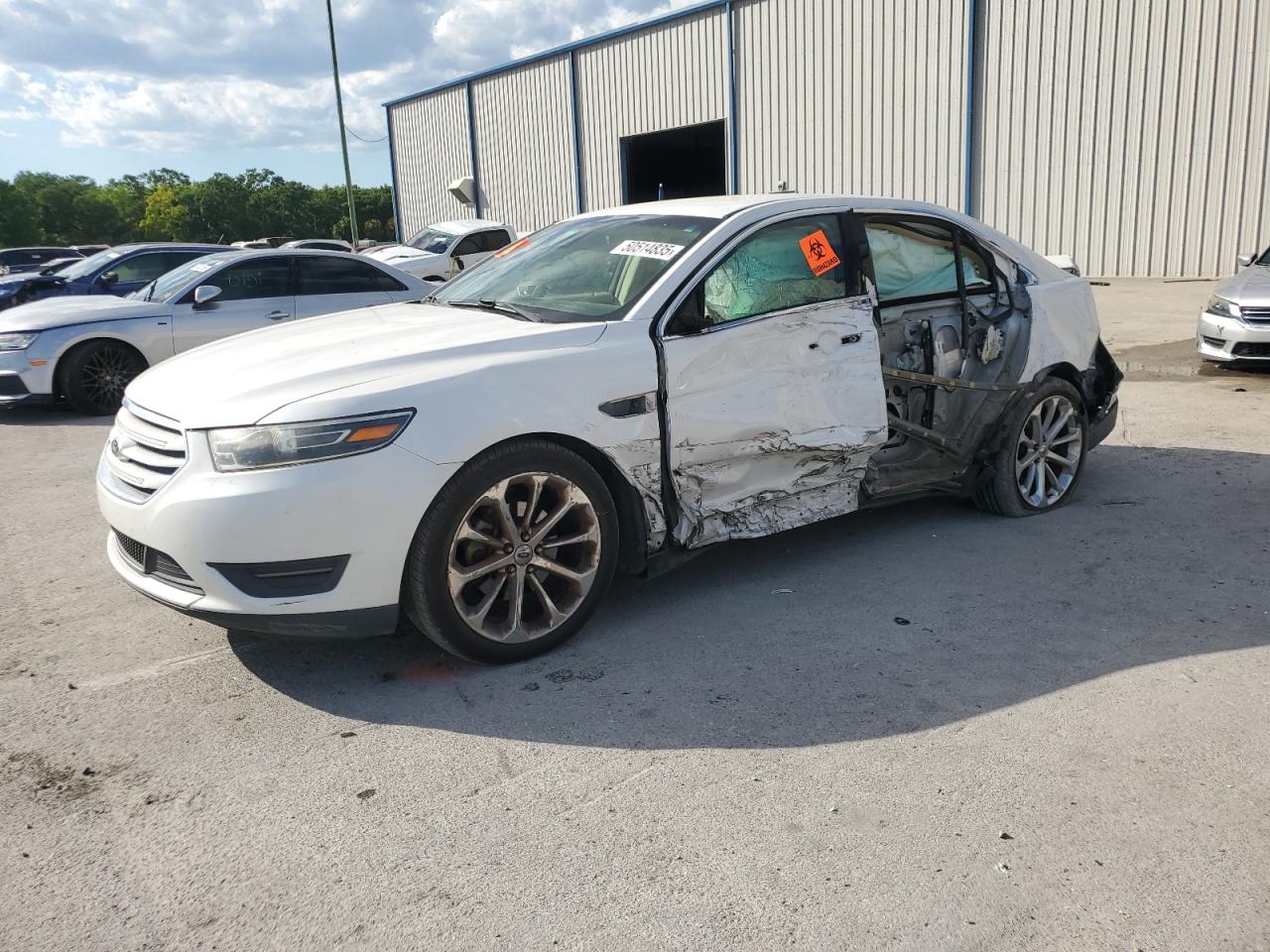FORD TAURUS 2014. Lot# 50514835. VIN 1FAHP2F83EG159025. Photo 1