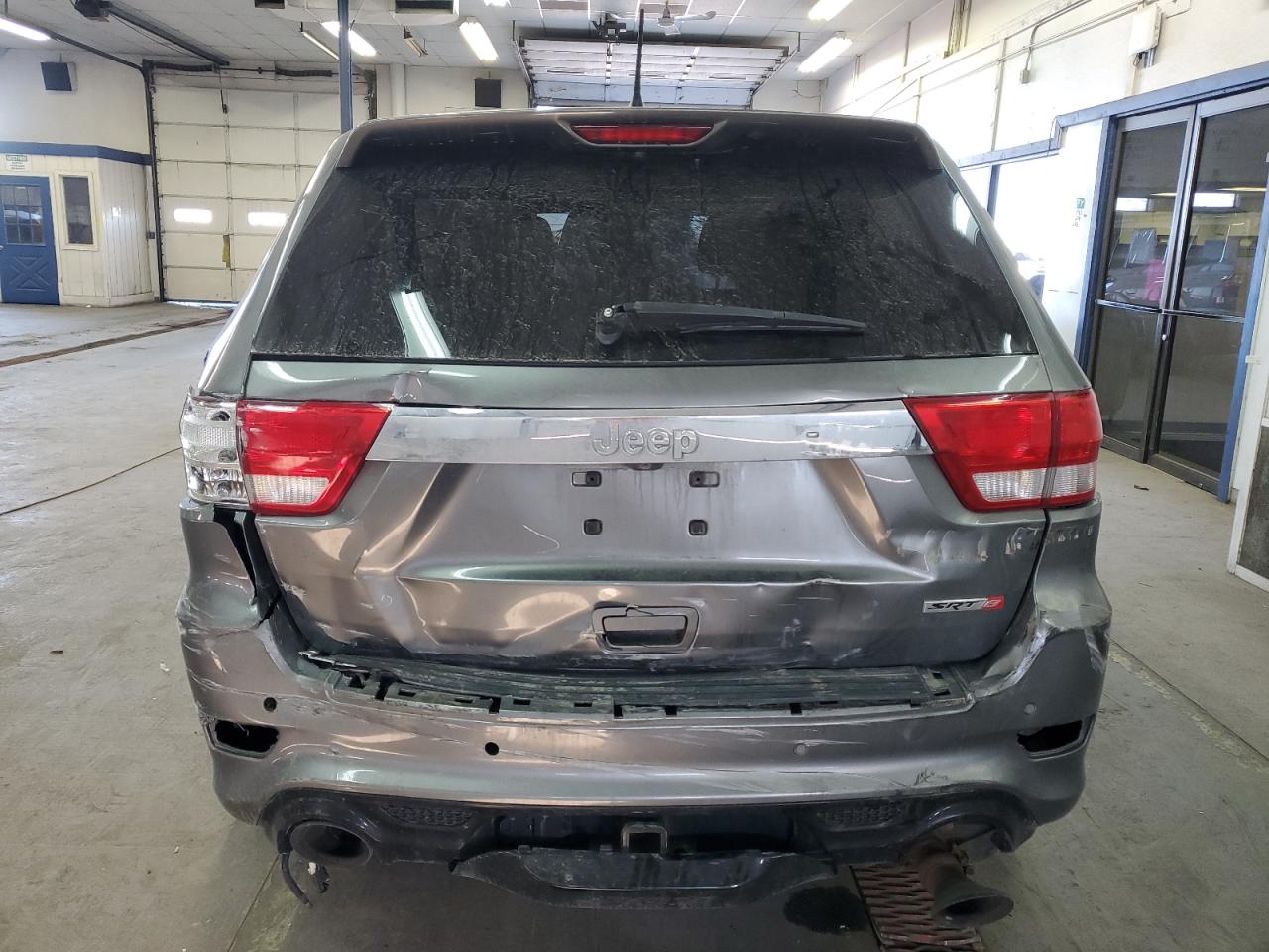 2012 Jeep Grand Cherokee Srt-8 VIN: 1C4RJFDJ8CC205823 Lot: 48073195