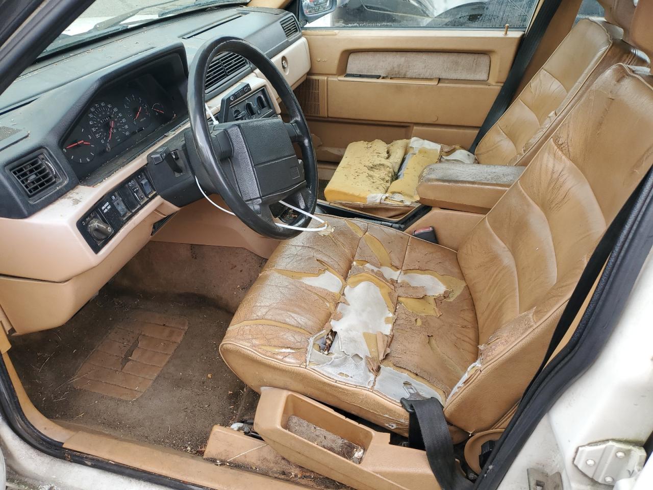 1991 Volvo 740 VIN: YV1FA8850M2332112 Lot: 49723155