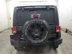 2014 Jeep Wrangler Unlimited Sahara for Sale in Madisonville, TN - Side