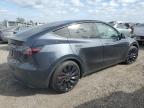 2024 Tesla Model Y  na sprzedaż w Houston, TX - Side