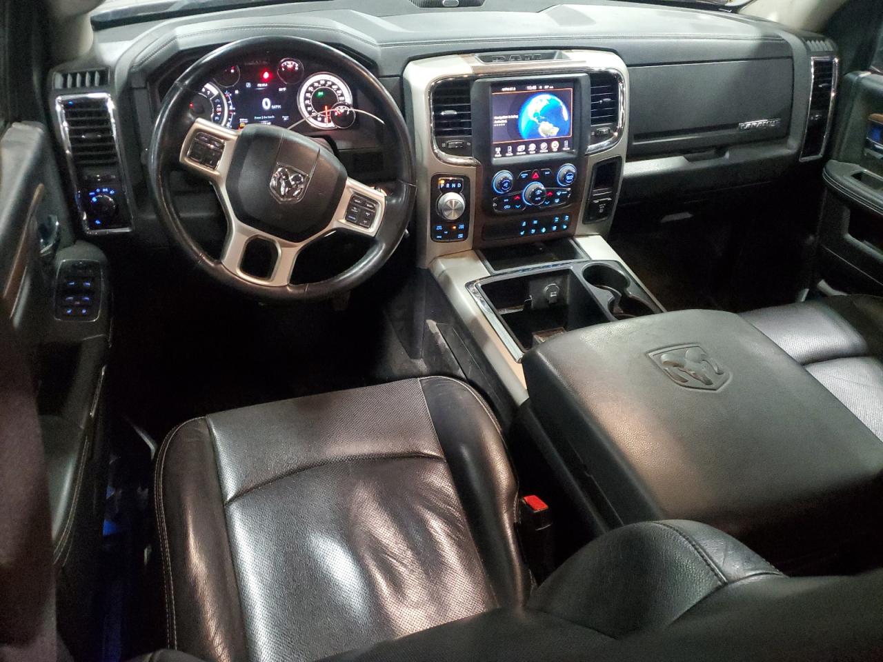 2014 Ram 1500 Laramie VIN: 1C6RR7NT4ES473329 Lot: 49459395