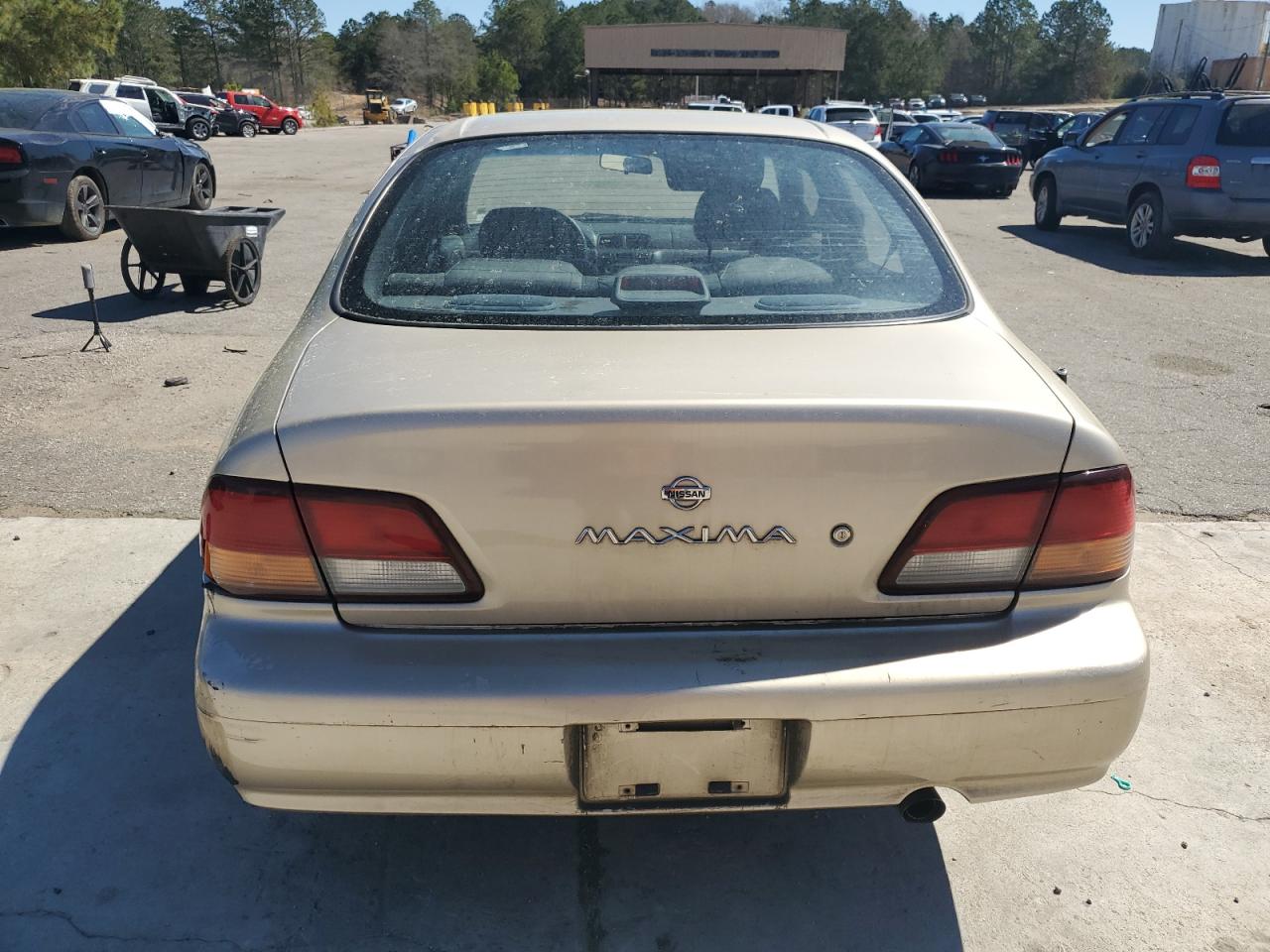 1997 Nissan Maxima Gle VIN: JN1CA21DXVT877062 Lot: 49411185