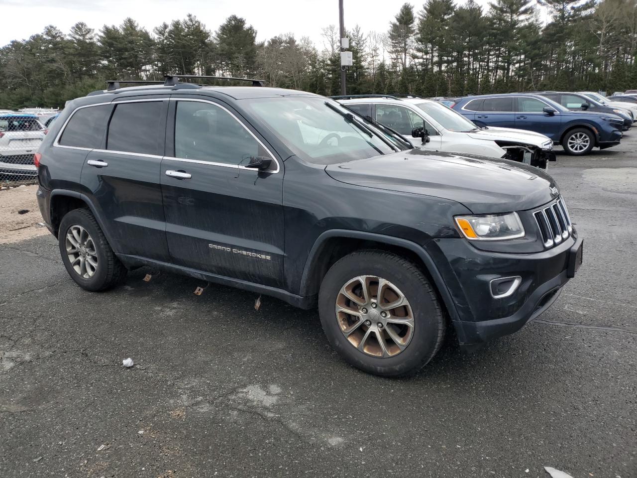 2014 Jeep Grand Cherokee - Image 4