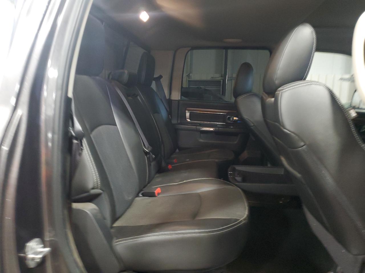 2014 Ram 1500 Laramie VIN: 1C6RR7NT4ES473329 Lot: 49459395