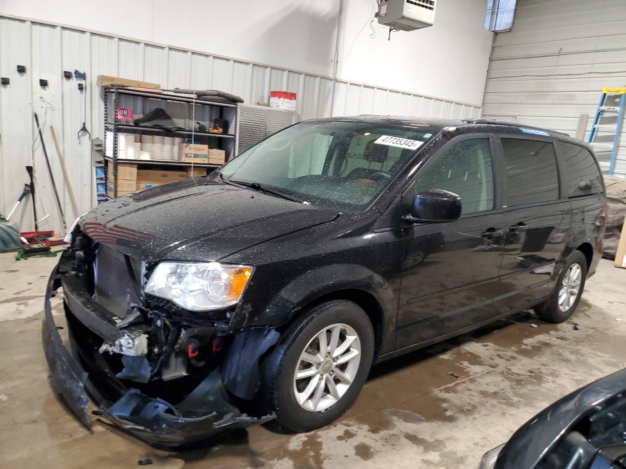 2014 Dodge Caravan - Image 1