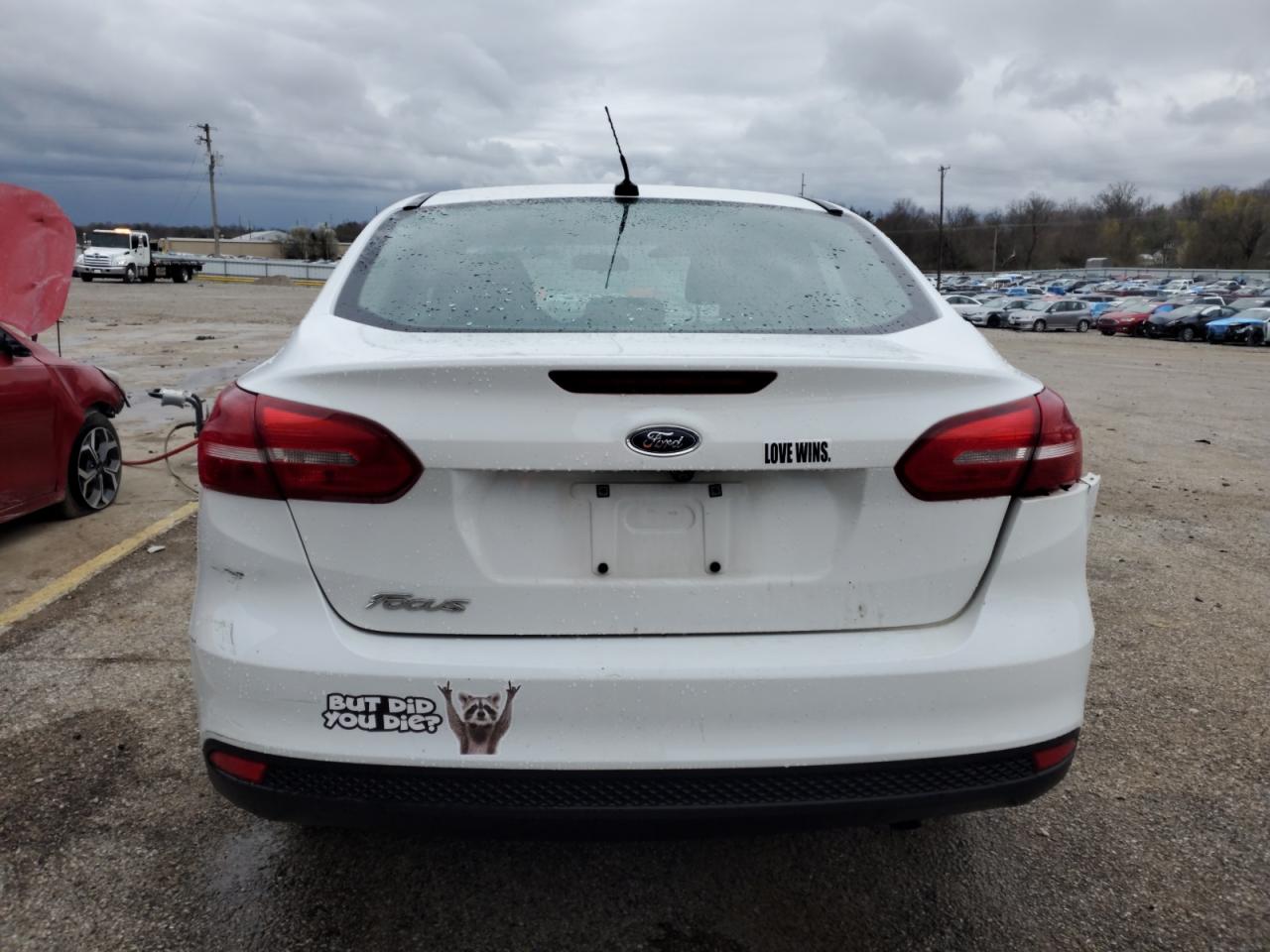 2017 Ford Focus S VIN: 1FADP3E20HL313106 Lot: 49986815