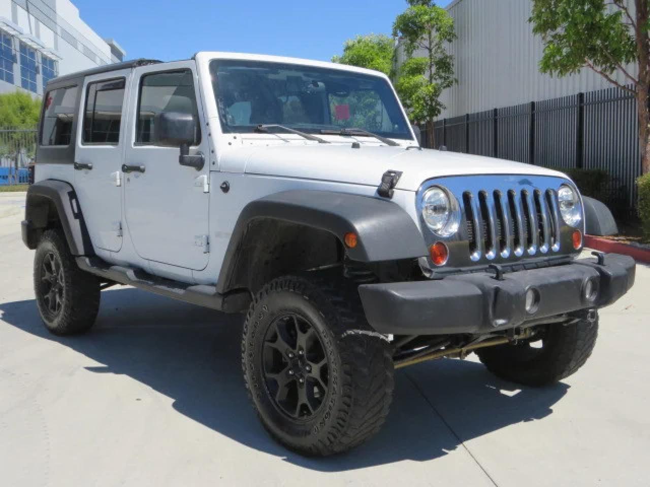 2012 Jeep Wrangler Unlimited Sport за продажба в Van Nuys, CA - All Over