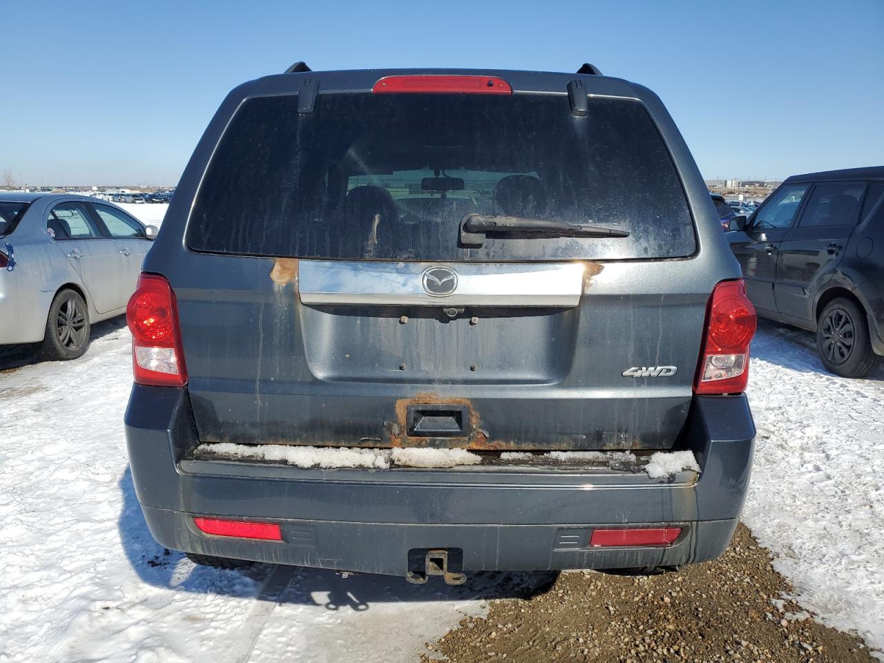 2010 Mazda Tribute S VIN: 4F2CY9GG1AKM06002 Lot: 47694195