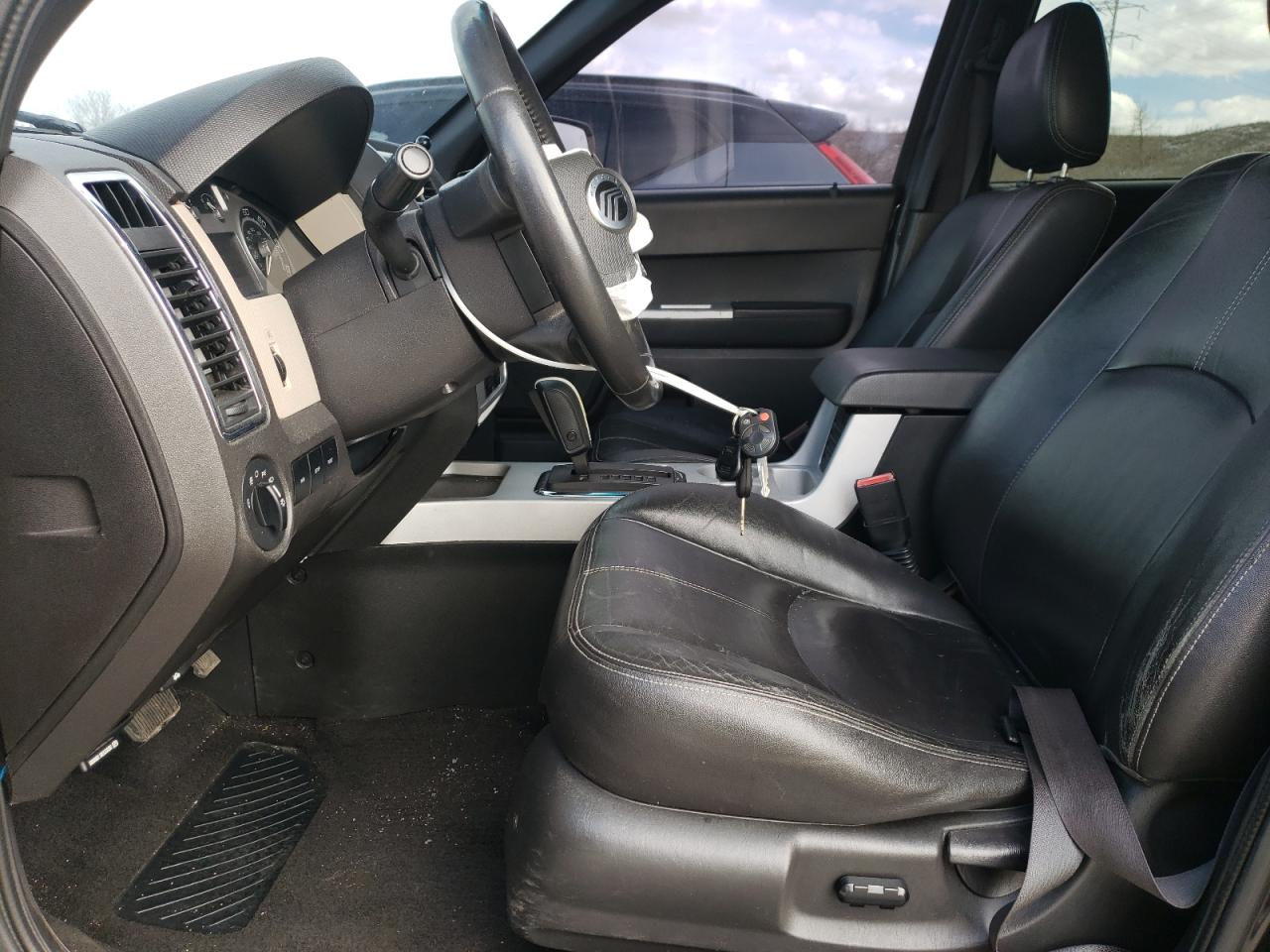 2008 Mercury Mariner Premier VIN: 4M2CU87168KJ18000 Lot: 49802615