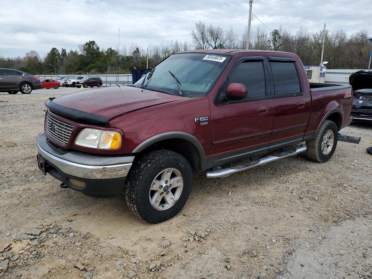 2003 Ford F150 Supercrew продається в Memphis, TN - Side