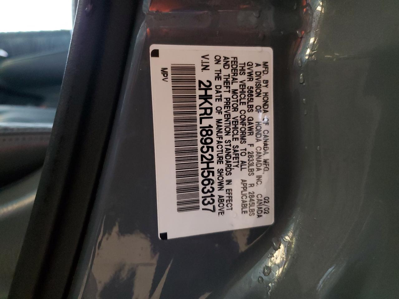 2002 Honda Odyssey Exl VIN: 2HKRL18952H563137 Lot: 49272985
