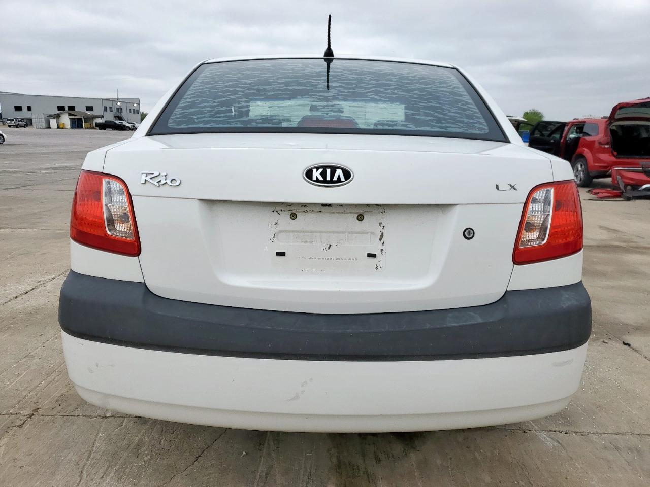 2007 Kia Rio Base VIN: KNADE123376221385 Lot: 51163535