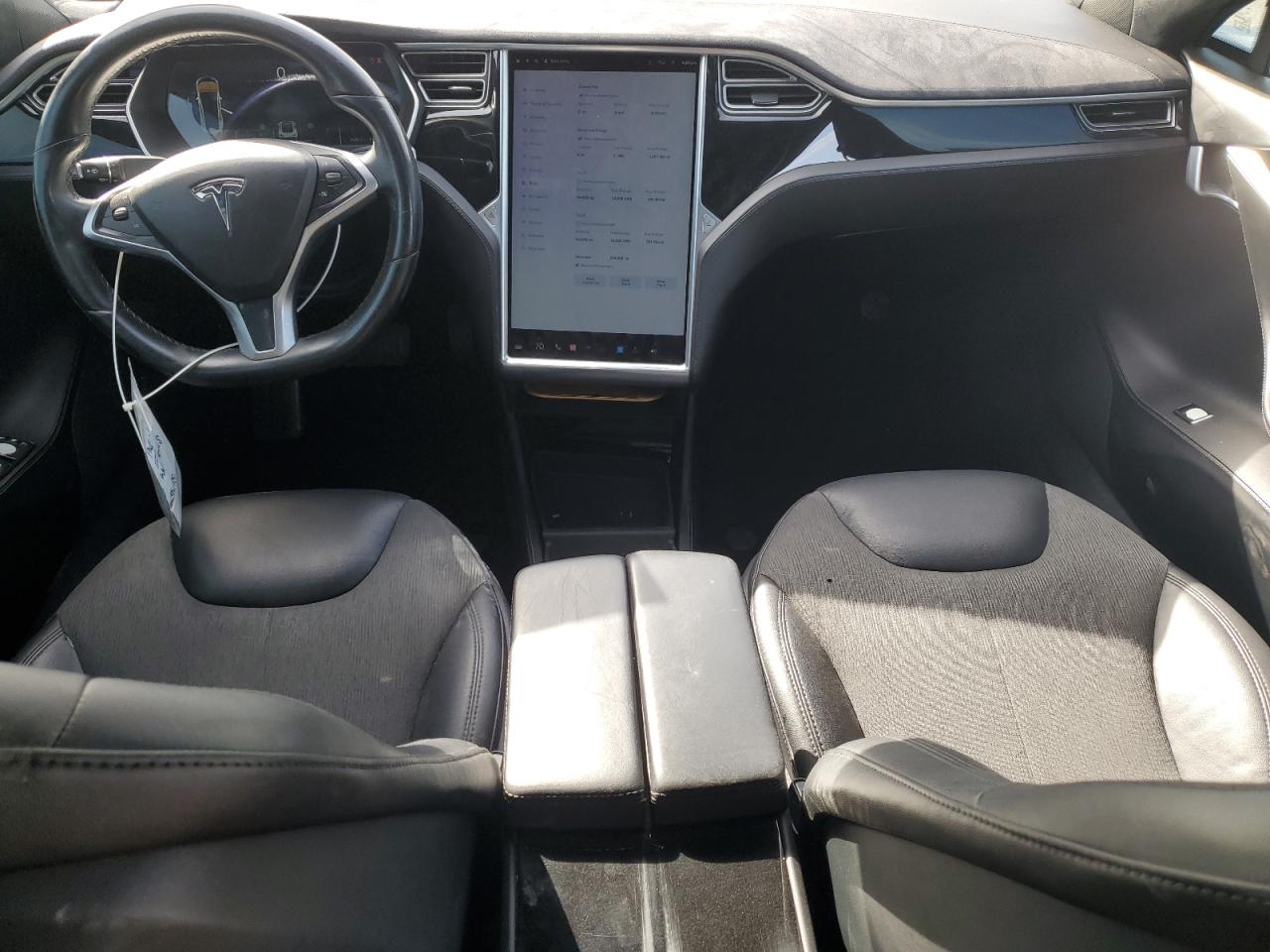 2015 Tesla Model S VIN: 5YJSA1E14FF115692 Lot: 49023955