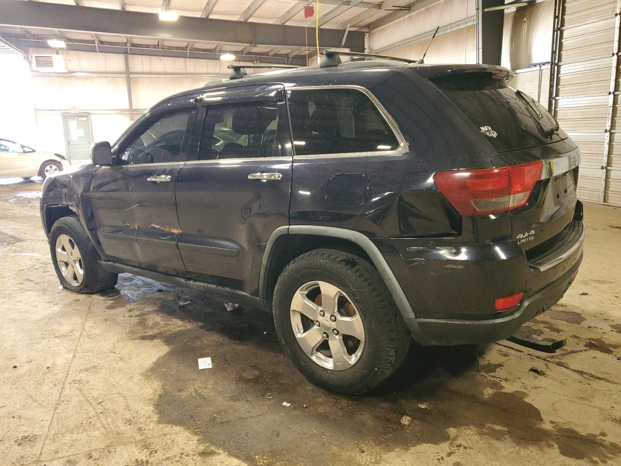 2011 Jeep Grand Cherokee - Image 2
