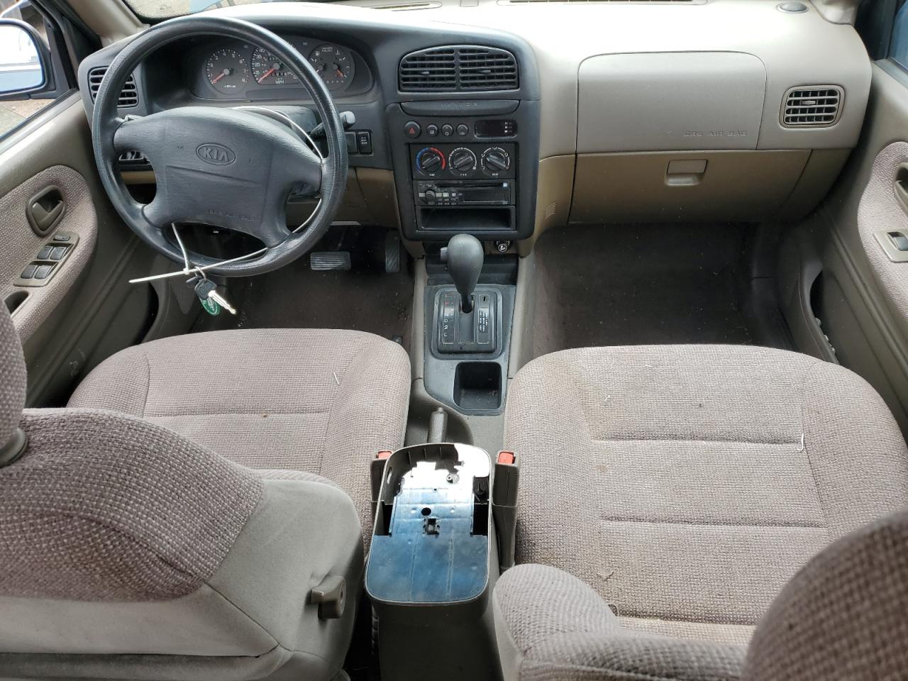 1999 Kia Sportage VIN: KNDJB7232X5612065 Lot: 47575445