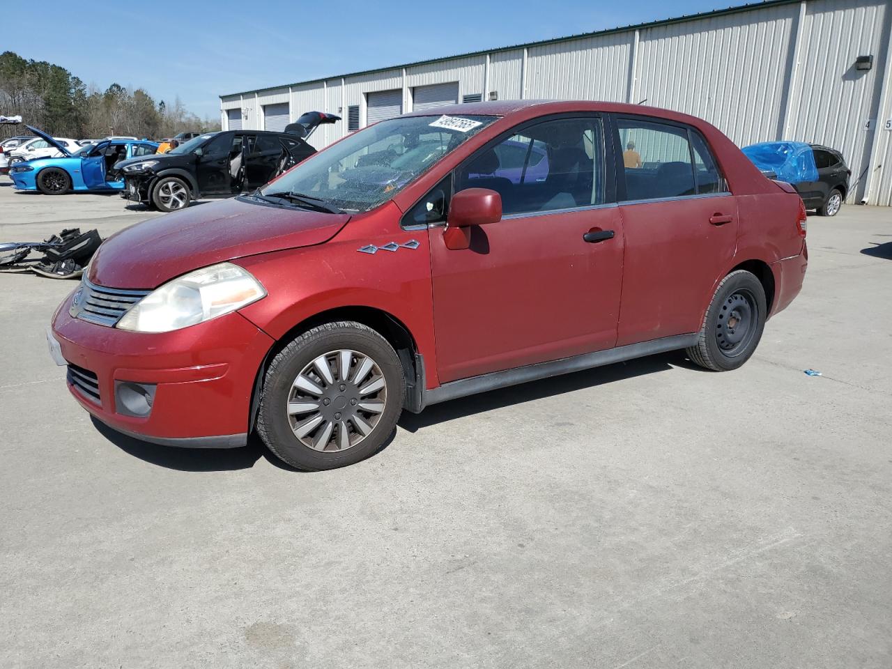 2009 Nissan Versa S იყიდება Gaston-ში, SC - Side