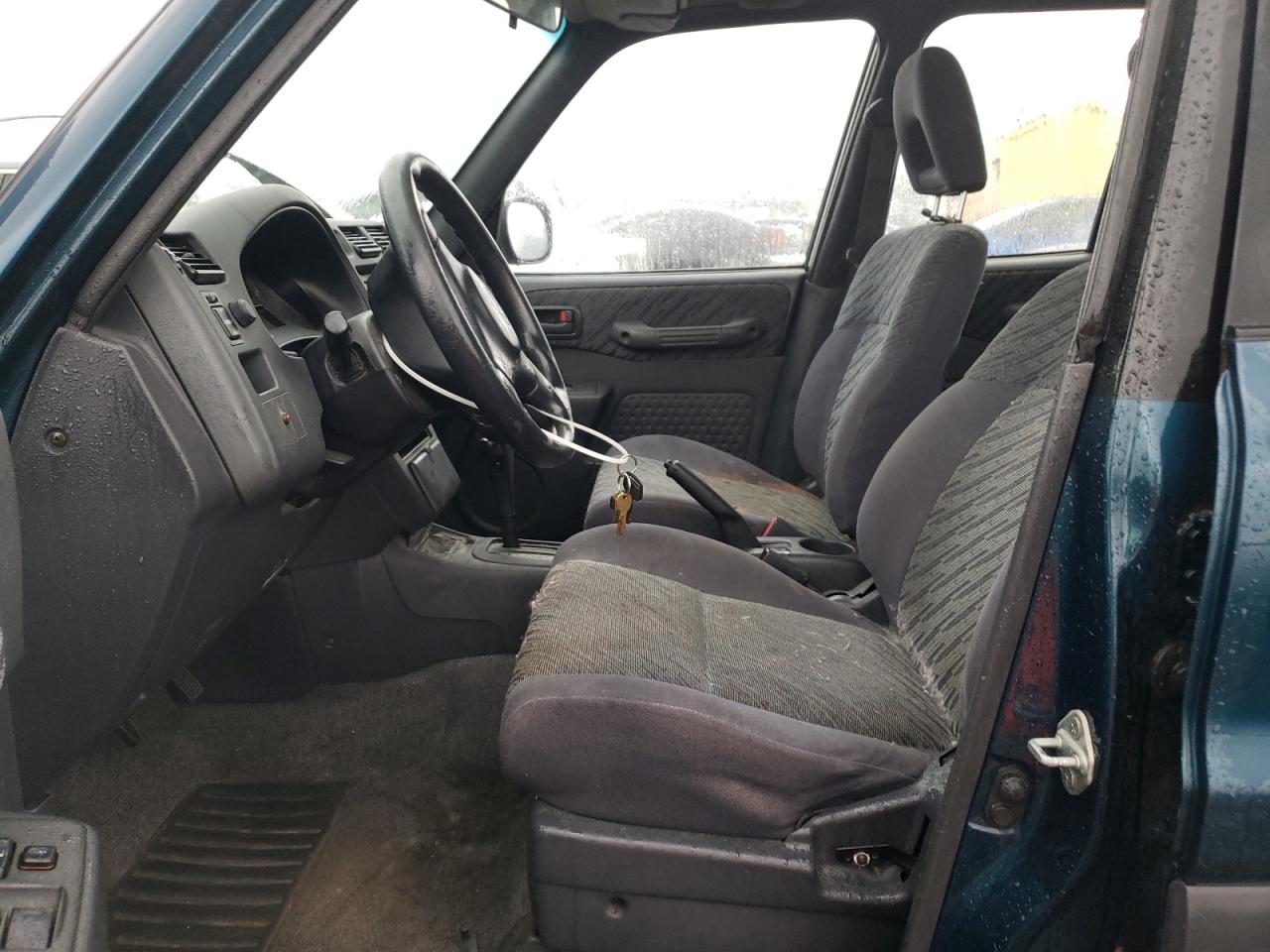 1998 Toyota Rav4 VIN: JT3GP10V6X0036057 Lot: 49011295