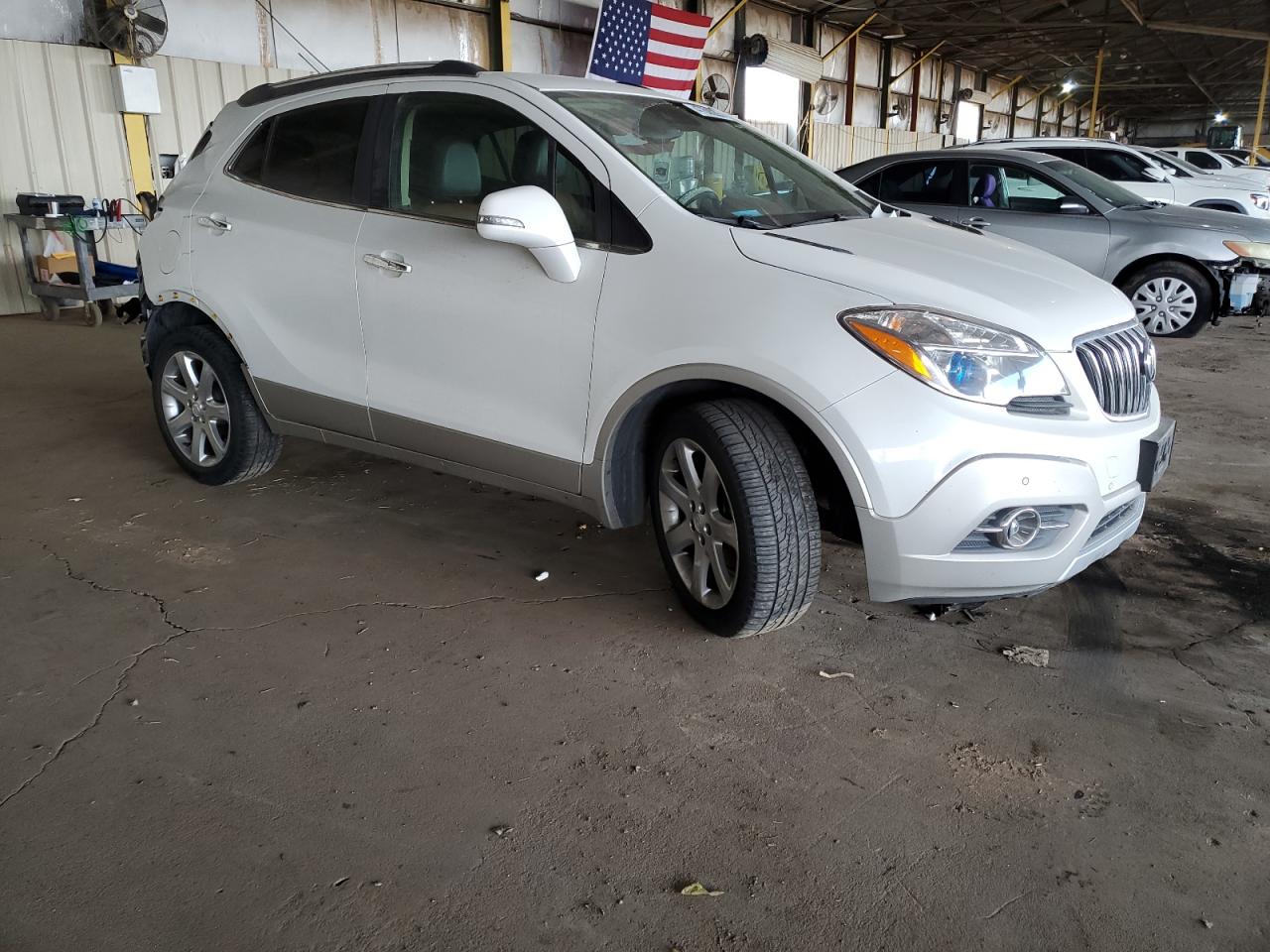2015 BUICK ENCORE with REAR END damage, VIN KL4CJDSB6FB259549