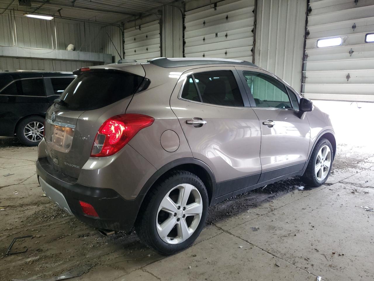 2015 BUICK ENCORE with MINOR DENT/SCRATCHES damage, VIN KL4CJASBXFB202642