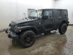 2014 Jeep Wrangler Unlimited Sahara for Sale in Madisonville, TN - Side