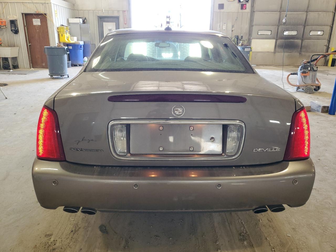 2003 Cadillac Deville VIN: 1G6KD54YX3U290175 Lot: 48972175