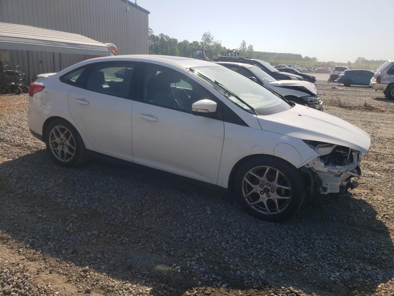 VIN 1FADP3F29FL285883 2015 FORD FOCUS no.4