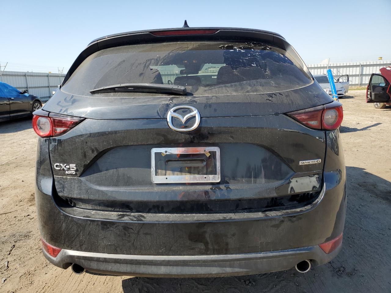 2021 Mazda Cx-5 Touring VIN: JM3KFBCM2M0445936 Lot: 50690814