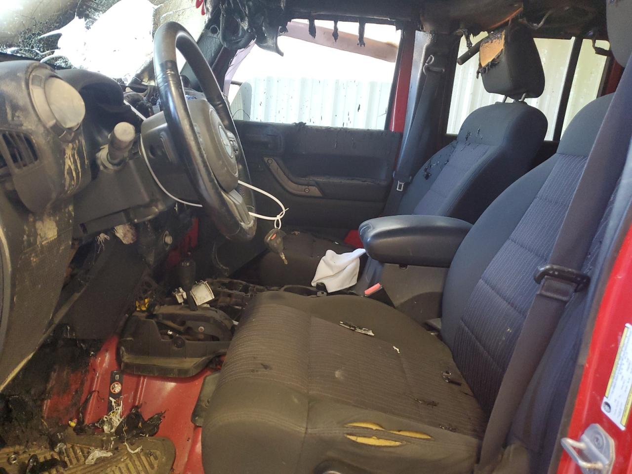 2012 Jeep Wrangler Unlimited Sport VIN: 1C4BJWDG5CL116975 Lot: 50827944